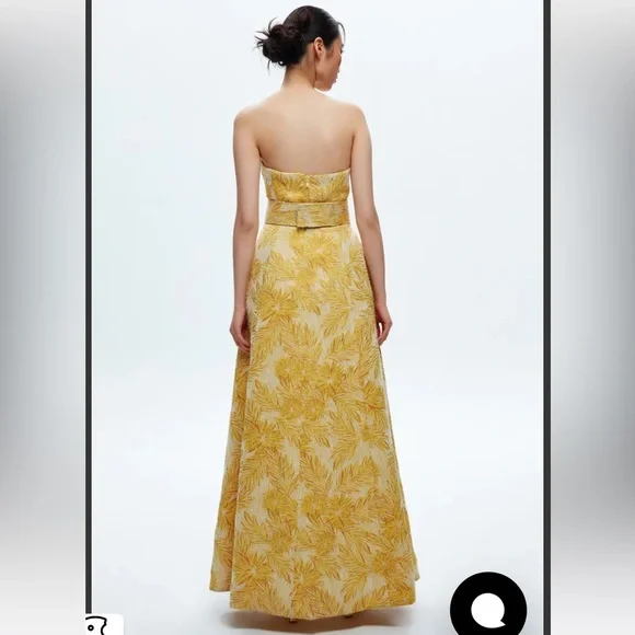 Yellow jacquard strapless gown